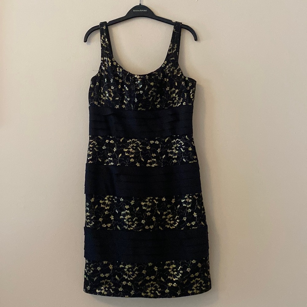 Black and gold cocktail dress with gold and mesh floral details